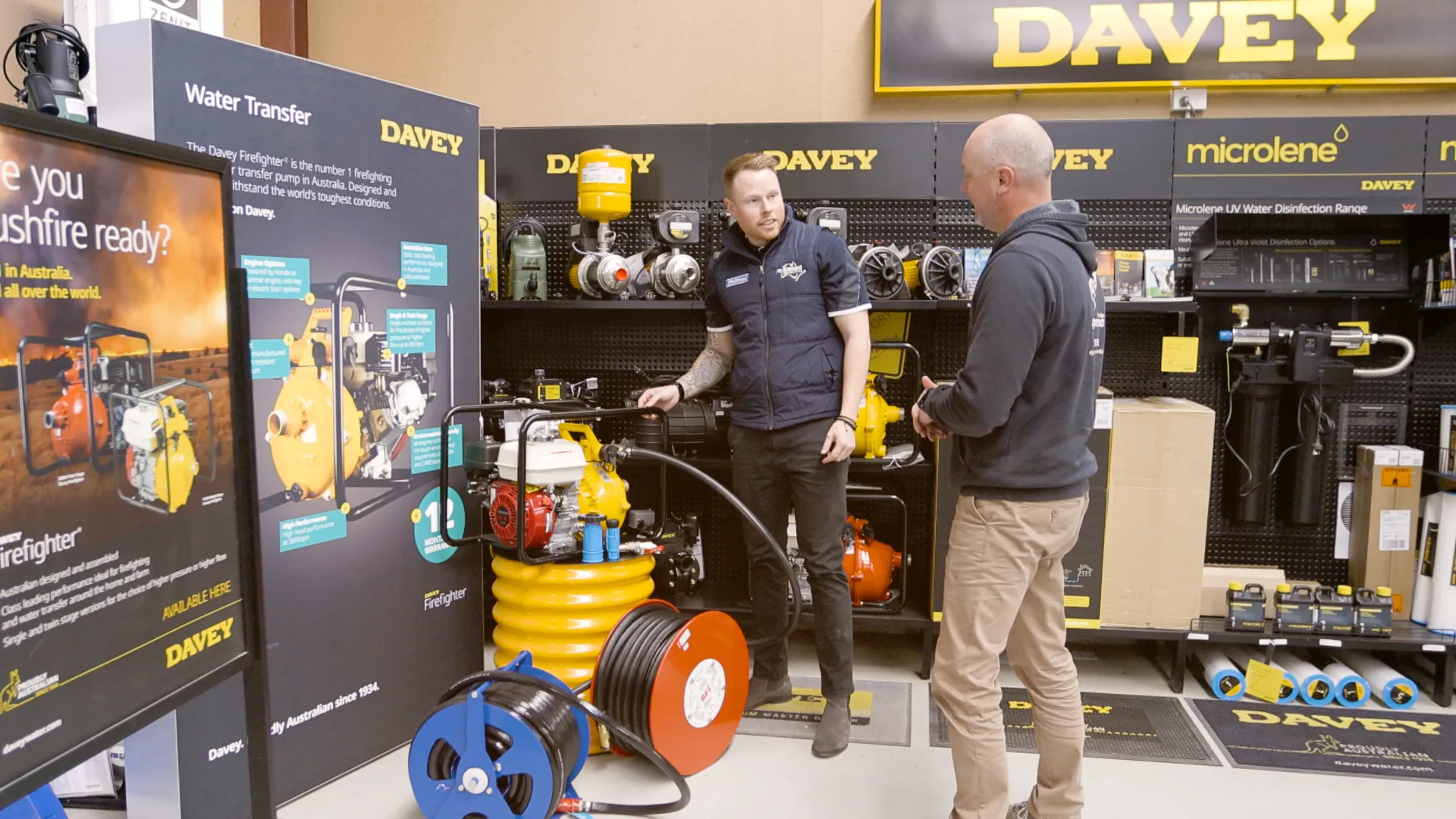 davey-why-choose-davey-251124 Midland Irrigation service truck parked at residential property during professional sprinkler system installation with pop-up sprinklers watering lawn