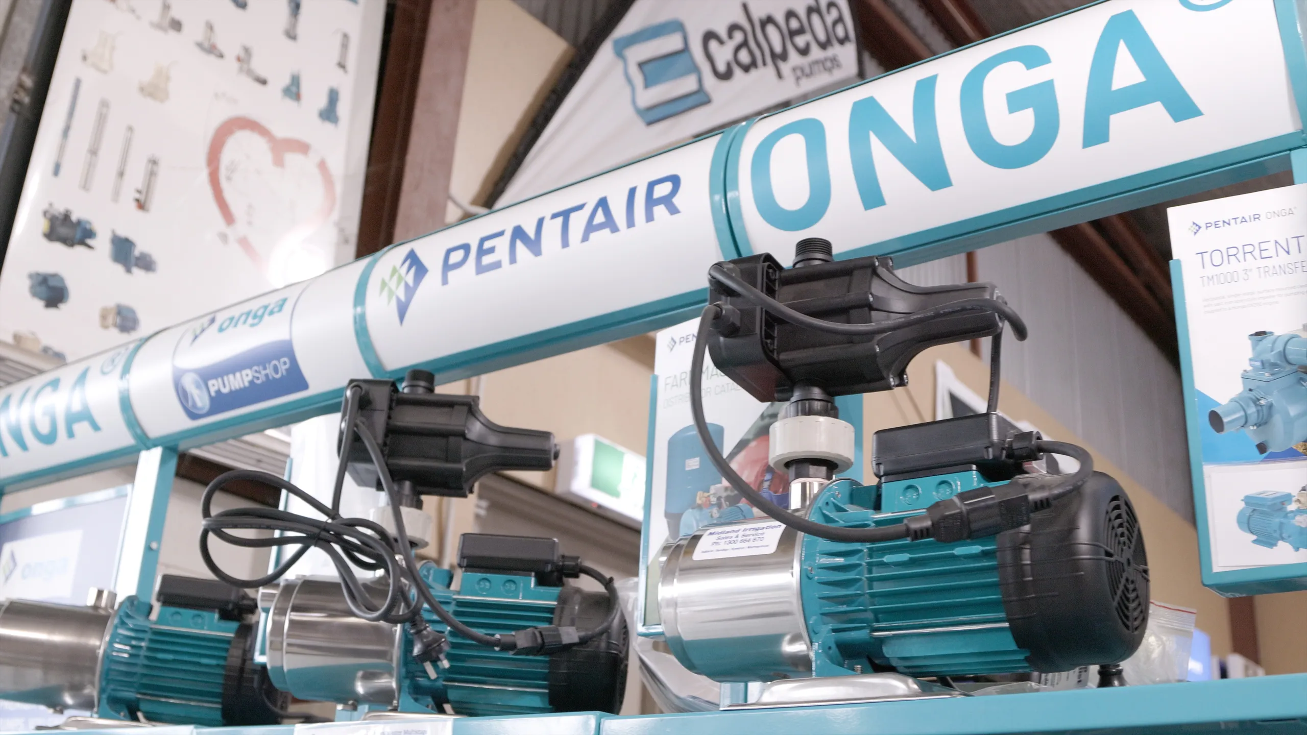 Midland Irrigation service truck parked at residential property during professional sprinkler system installation with pop-up sprinklers watering lawn